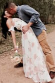 I ordered these for our engagement shoot. It was incredibly stunning! It was a little too tight & I got it altered to lower the zipper in the back. - Arely S.