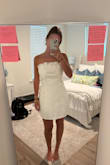 Obsessed with this dress!! The white strapless look is super cute and actually stays up. The fabric is soft, not see-through, and feels really nice. I wore it to graduation and got so many compliments. Easy to dress up with heels or throw on some sandals for a more chill vibe! - Kate S.