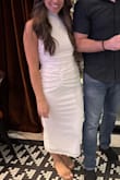 Super stretchy material and very classy. I got multiple compliments wearing this dress to my rehearsal dinner. It is a little see through so you will need to wear nude underwear and a stick on bra. - Leilani M.