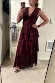 This dress is beautiful and comfortable. I did have to get the neckline tailored because it was just a little too low for my liking. But otherwise, it's very comfortable and the perfect length! The medium fit me perfectly. - Amber C.