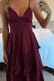 Beautiful dress, silky material was nice and thick, but this dress was much too busty for the event I'm shopping for. - Cheryn M.