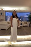 I wore the gown at my ceremony for our 25 year vow renewal. The mermaid gown was pure white and perfect for our vow renewals. - Jessica M.