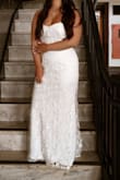The sleeves are a no go for me, but the flower details are absolutely beautiful. They give the dress such a romantic feel. I did have it altered to fit my short stature and remove some of the excess lace material in the bust that was bulging up. Looked amazing in my wedding photos and in person. Very happy with the purchase! - Jess W.