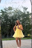 This dress was so fun for my daughter to wear to the wedding. There is NO stretch to this dress so pay attention to the sizing of the chest/ribcage area. - Rebecca B.