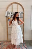 I NEVER leave reviews for anything but I had to for this one. This dress fit perfectly and I received SO many compliments on how beautiful it was. I felt like a princess. It was PERFECT for my bridal shower! - Regan K.