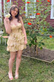 My daughter had a Greek theme homecoming, and this was perfect with the creamy gold color. The gold shimmer accents were perfect. She has a larger chest, so figuring out the bra situation was hard. You will see a strapless bra through the back because of the corset ties, so we went with a stick on bra that has the clasp in the front. I recommend sizing down in the stick on bra you will need for this dress. The only thing I would change is that it had more support in the top, so you didn't have to wear a bra. The dress is short but not too short. She danced comfortably in the dress the whole night! Really loved and she got lots of compliments! - Gigi A.
