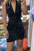 Very sexy! Very low cut. A little too low cut for my taste & it does ride up a little bit! But besides that, very beautiful & high quality dress! - Rhyan L.