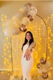 I wore this dress for my bridal shower, and I absolutely loved it! It fit so well and I didn't have to wear any shapewear underneath. The fabric is stretchy and hugs like a glove. I got so many compliments on it, and I might wear it for my reception if I decide to change out of my wedding dress! - Hannah B.
