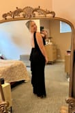 Stretchy and comfy dress. The bottom is closed, so it was quite toasty. Better for a winter event. But kept it and love it! - Jenni H.