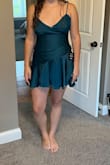 Beautiful teal color and fits my daughter perfectly. She has a long torso and long legs, and this dress is not too short like most she's tried. Probably best for smaller chests. - Rena S.