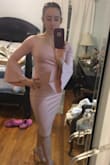 Fits nice. It's stretchy. Material is a little thick so probably better to wear when it's not too hot. Not quite fancy enough for a wedding but probably more for like a fancy dinner. - Lydia C.