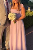 The dress is beautiful and flattering. It's also good quality. The dress is long, and the straps are slightly too long, but it can be hemmed pretty easily. - Vanessa O.