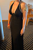 The dress initially came sewn incorrectly, but customer service was on it so quickly and expedited a new dress to me extremely fast! I'm a little short, so I had to get the dress hemmed a couple of inches, but that is pretty standard for me. I received so many compliments the night of the ball! - Christina W.