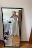 Fits well, a little short, so I can't wear heels. Decent support for large bust, but I don't think I have enough room for a bra underneath. 
Dress held up well when I steamed it to get the wrinkles out. Definitely keeping it. - Casey W.