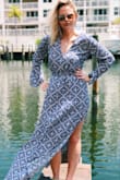 Love this dress. The sleeves are the perfect shape and it's not super heavy. So on a 85 degree Florida day, it's the perfect brunch dress. Originally ordered a medium but it runs a little large so returned for a small and it's so perfect. - Meaghan M.