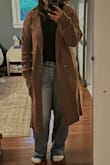 I got the brown for fall, and I love it. I sized down to medium, as I read it runs large, which it does slightly. I love pairing the coat with baggy jeans and a fitted top. - Tipya H.