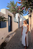 I bought this dress for my engagement photoshoot in Greece, and it was absolutely stunning! It fit perfectly and was so comfortable. The straps can be adjusted so that they stay in place. I was able to walk for miles through Santorini finding the perfect spots for photos and still be comfortable in this dress! Love it!! - Katie K.