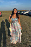 First off, this is supposed to be a midi dress for a normal height person, but I'm only 4'11 so it was long thru my ankles. It fit me perfectly and I got so many compliments on it all night! It was comfortable for the most part but a little tight in the waist area. I found out I couldn't eat more than 2 tacos or else it was hard to breathe in it while sitting down. Other than that, I really love this dress! - Tisha A.