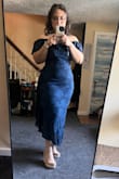 I'm in love with this dress! I'm usually a medium, decided to get a large and I'm glad I did because it runs a little bit small. The fabric of the dress doesn't stretch. The dress definitely hugs my curves, and I got plenty of compliments! - Ruthy C.