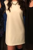 This was very cute and modest dress that I wore one night of my bachelorette party. It was a little bit loose but it looked good with knee high boots and a necklace. It hit me above the knee so I could wear spanks underneath, which is nice. Very comfortable and great material, just a little boxy, so 4 stars instead of 5. - Lauren S.