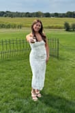 I got this dress for my bachelorette and it was stunning! I received so many compliments! It came with straps, but I decided to go with the strapless option. I will say if you have a smaller chest, the top may be too big for you. Regardless, I loved it and will be wearing it again on my honeymoon! - Michelle O.