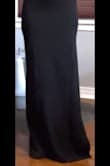 This fits well, is stretchy, looks flattering; however, it does run long, and you will most likely have to have it hemmed. In the photo, I have heels on, and it still drags on the floor - Rachel S.
