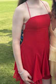 This dress was so cute! Perfect length (I'm tall, so sometimes they're shorter than expected) and super comfortable. Very easy to steam and get wrinkles out, and the straps in the back are great for a tighter fit/adjustments. The part with the zipper on the back was a little big, but I pinned it and it looked great! - Charlotte B.