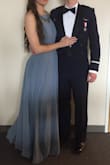 I got this dress in Slate Blue and M and in Navy in S to wear for a military ball and both were beautiful. I liked the way that the M hung on my frame just a little better so I wore that one and let a friend wear the Navy. The length was just perfect with 3 inch heels, no alterations is always a perk. The adjustable back did help make sure that the chest hit at the right height and that it was the right length on the ground. - Kathryn L.
