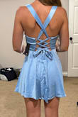 It fit perfectly. Loved the pockets and loose skirt. Liked the strappy back too. - Jackie S.