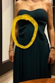 The dress is beautiful. The color is just like in the picture. The design is great. It looks gorgeous in the model. The thing is that is not well made. The fabric in the mid section is totally loose. It makes the dress look cheap and it doesn't flatter your body. - Adriana S.