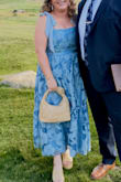 Loved the look of this dress! Wore it for a summer wedding and summer welcome party. Received so many compliments! It definitely is tight in the chest area, and the floral overlay made my chest look a little funky from the side. Because it was so tight on my chest, the floral overlay did rip a little at the seam when I sat down, but no one would notice unless I pointed it out. Just a bummer. I was able to wear it with a bra, which was great. Just disappointed it ripped a bit because I do really love this dress. - Sarah S.
