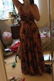 This dress is so amazing! The material is very flattering without being too revealing and thin. I was worried about the bust being baggy as some other reviews mentioned, but with the adjustable straps all was well! I might have to get it hemmed as I am pretty short, but I don't know what height my heels will be, so I will see. Love this dress and am wearing it to an award gala! - Leah C.