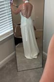 Beautiful dress but a tad loose in the chest area. I'm 5'9 and I would need it taken in at the length even with heels. - Brianna R.