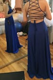 This dress is beautiful! The skirt is swishy if you walk right. There is a method to getting in and out of it but once you have it on you'll feel beautiful!! The fit was fantastic on me and it's such a high quality dress. The back is definitely adjustable and would fit a variety of sizes. I felt beautiful at prom!! - Emma V.