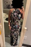 This dress is stunning! Definitely a head turner. I do have an hour glass figure so this complimented. I have to alter the chest area with darts as there is a slight gap on the sides. But the dress looks amazing, and easily able to dance! - Rachel C.