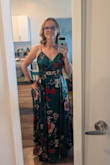 The dress is more emerald than the photo shows, but otherwise great. I got so many compliments! I did need to get it hemmed as it was made for someone with 4" on me. Also even with small chests, you'll want take to keep the top in place. I nearly flashed people when sitting down and had to use tape. - Paige B.