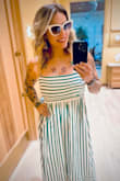 Such a flattering dress on! It's fitted nicely at the bust and the material is nice and light, perfect for warmer days. Great dress to wear out casually or to dress up a bit. - Natalia S.