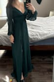 This dress is so flattering and classy. It fits true to size, although had to be hemmed. The green colour is exactly as shown and is really pretty. - Leigh M.