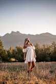 The dress fit like a glove and was perfect for my senior photo session. Feminine, flattering,  and flawless. - Jen W.