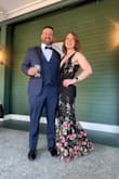 This is a very flattering dress and I got a million compliments on it. It does not have a lot of stretch but is still very comfortable. Very dramatic and perfect for a black tie wedding. - Maria B.