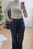 I am glad I sized up (from M to L). The shirt is very thin, but I still like it enough to keep it. - Amanda D.