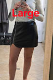 A lot of reviews said to go up a size. I normally wear a Med. I tried the Med and the Large. This skirt is very stretchy and has a lot of give. The large is a little big on my waist, but give more of an "a-line" silhouette. The medium fits like a bodycon skirt. - Amanda D.