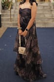 The fit was great including the length even with heels. The layers added some nice volume and movement to the dress. Definitely recommend! - Kamal D.