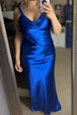 I ordered this for an event, along with another dress since I tend to fall between sizes. I ended up keeping this one even though it's not quite the vibe for the event. Satin doesn't always play nice, but this dress hits in all the right places and feels so comfortable on. The color is so vibrant in person it's unbelievable. There was no way I wasn't keeping this one, and I look forward to wearing it out. - Heather G.