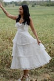 This dress fit perfectly and was exactly the style I was looking for. The material is lightweight and flowy. - Christiana W.