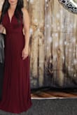 Love this dress. Got it for my BFF's wedding and I fell in love with it. So many different styles to wear it. Very comfortable and a good fit. Can spread the material in the front for more coverage or twist for less. Love love love the dress. I'll be getting a black one as well. Beautiful dress and well made. Thick and very flowy. - Pa V.