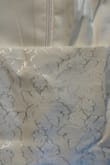 This dress was another of my options for my bridal shower. I took it out of the bag, and there was a stain right on the front near the neckline. I didn't have time to wait for a new one, so I crossed my fingers I could get the stain out if I chose this one. I ended up keeping it because it's beautiful, but I chose not to wear this one because the stain just will not come out. Not even my miracle stain remover can remove it. Oh well, it's not THAT noticeable. The top of the dress was also a little large in the chest for me. - Rebecca L.