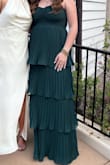I absolutely loved this dress. It was a little tight on my chest and a few friends had to work together to zip it, but I would still wear it! Because it was tighter, it actually stayed up really well and I only had to adjust it maybe once. - Campbell P.