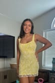 I absolutely love this dress from Lulus! The fit is perfect. It's flattering yet very comfortable to wear. The fabric feels high-quality, and the details are beautifully made. It looks exactly like the photos online, but even prettier in person. I'm very happy with my purchase and will definitely shop here again. - Maria M.