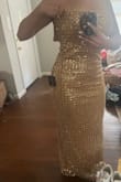 This dress fit literally perfectly, but I have to return since it's just a tone too tan/gold for the champagne color palette the bride requested. SO wish I could justify keeping it. - Tecia C.